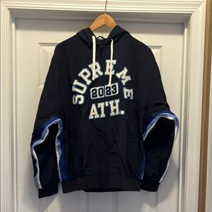NWT Supreme Navy Windbreaker with white/blue felt lettering.